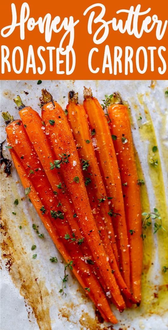 These Honey Roasted Carrots with thyme are cooked in the oven, giving them a beautiful glaze.  This is one of the best carrot recipes I have ever eaten! Make these simple oven roasted carrots for an easy but impressive side dish for Easter or any other dinner.