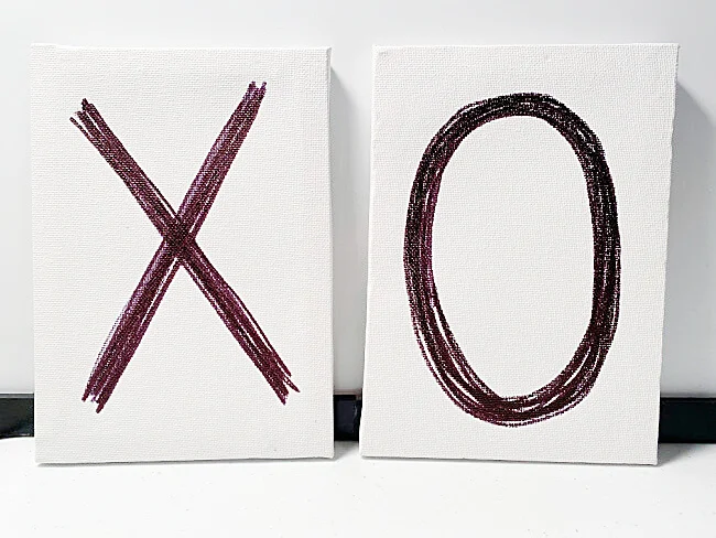 2 canvases one with an x and one with an o