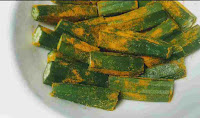 Bhindi coated with salt and turmeric powder for bhindi masala recipe