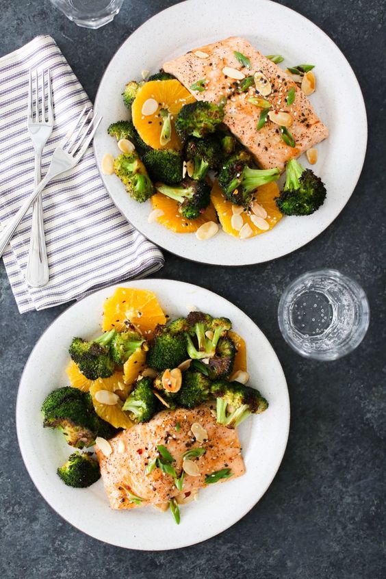 Sheet Pan Salmon with Charred Broccoli, Oranges & Asian Dressing | This healthy sheet pan dinner is an easy, quick and delicious recipe that’s perfect for a busy weeknight dinner, and just fancy enough to serve to guests. | Domesticate Me #domesticateme #sheetpandinner #salmonrecipes #healthyrecipes #quickrecipes #healthydinner