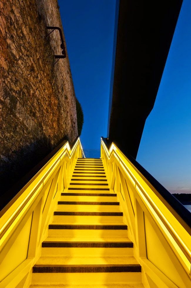 Outdoor modern staircase design with colored LED lights