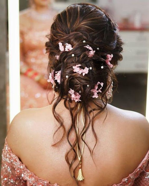 30+ Messy Bridal Bun Hairstyles with Flowers for Wedding - WallpaperDPs