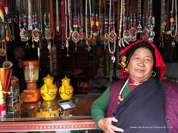 shopkeeper in Songpan Ancient Town in Sichuan Province, China shopkeeper in Songpan Ancient Town in Sichuan Province, China