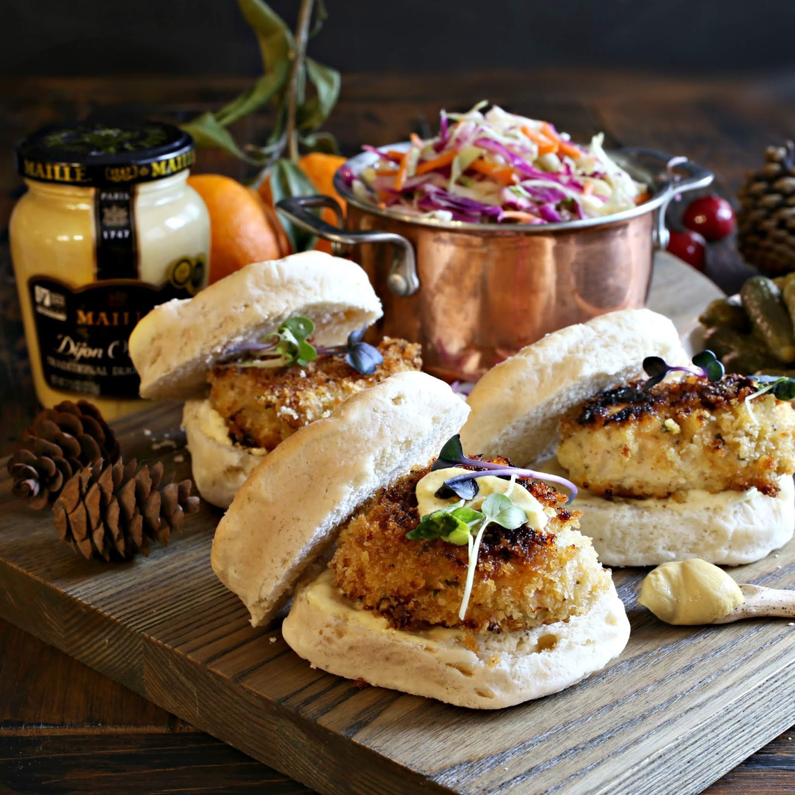Recipe for mini crispy buttermilk and mustard marinated chicken sandwiches served on biscuits.