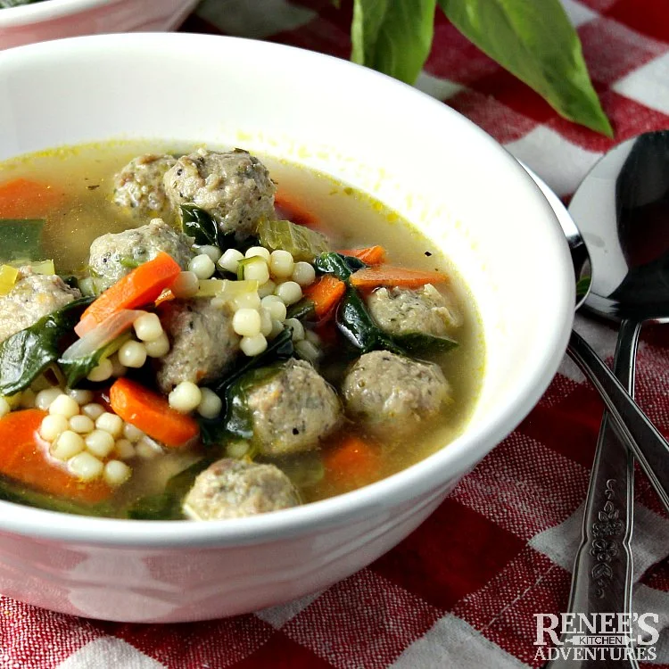 Close up image of a bowl of Easy Italian Wedding Soup by Renee's Kitchen Adventures