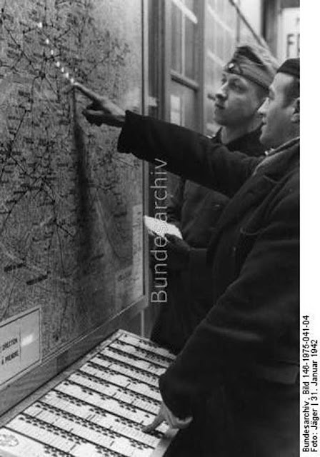 A civilian with a Wehrmacht officer, 31 January 1942 worldwartwo.filminspector.com