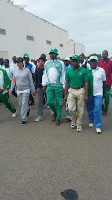 1 Minister of Environment, pictured in her jogging outfit as she participates in monthly jogging exercise for civil servants