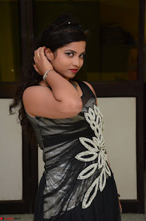 Shrisha Dasari in Sleeveless Short Black Dress At Follow Follow U Audio Launch 007