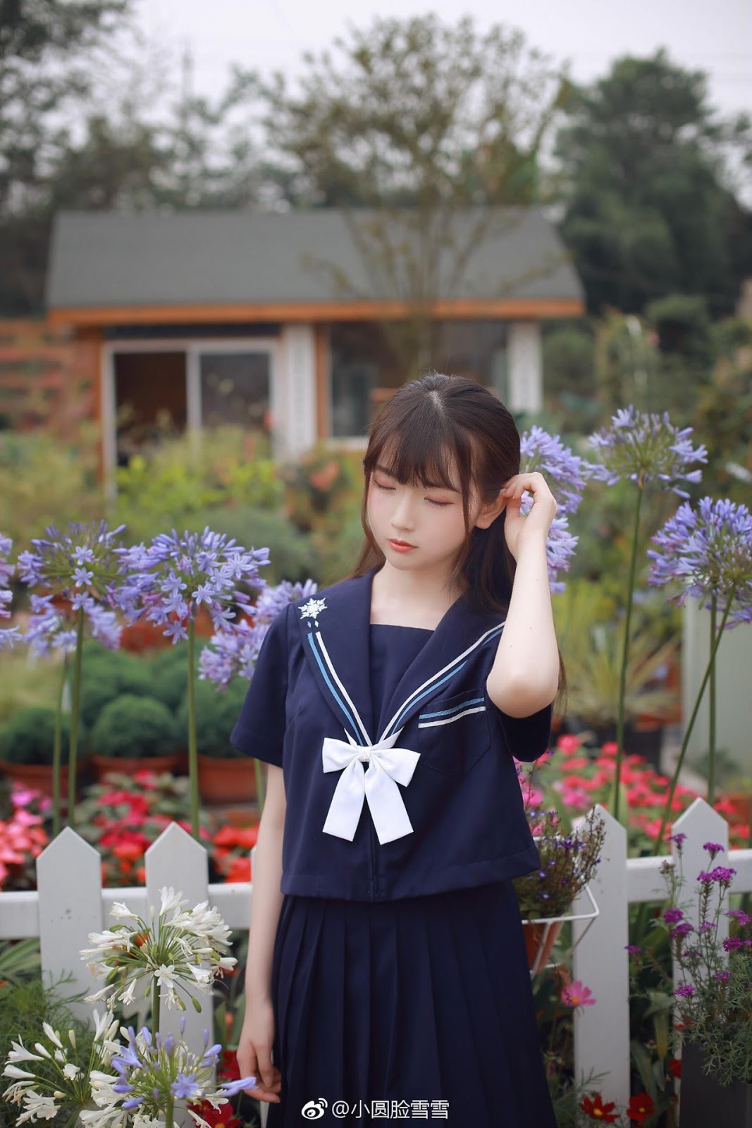 Chinese cute model - Little girl in the flower garden