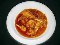 Serving Chicken curry in a serving bowl for easy chicken curry recipe