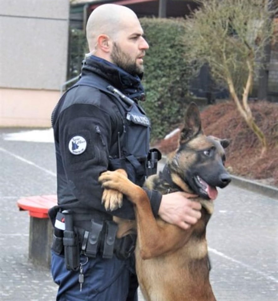 masculine-policeman-officer-uniform-dilf-bald-head-dog