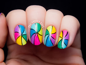 Rainbow pinwheel nail art by @chalkboardnails