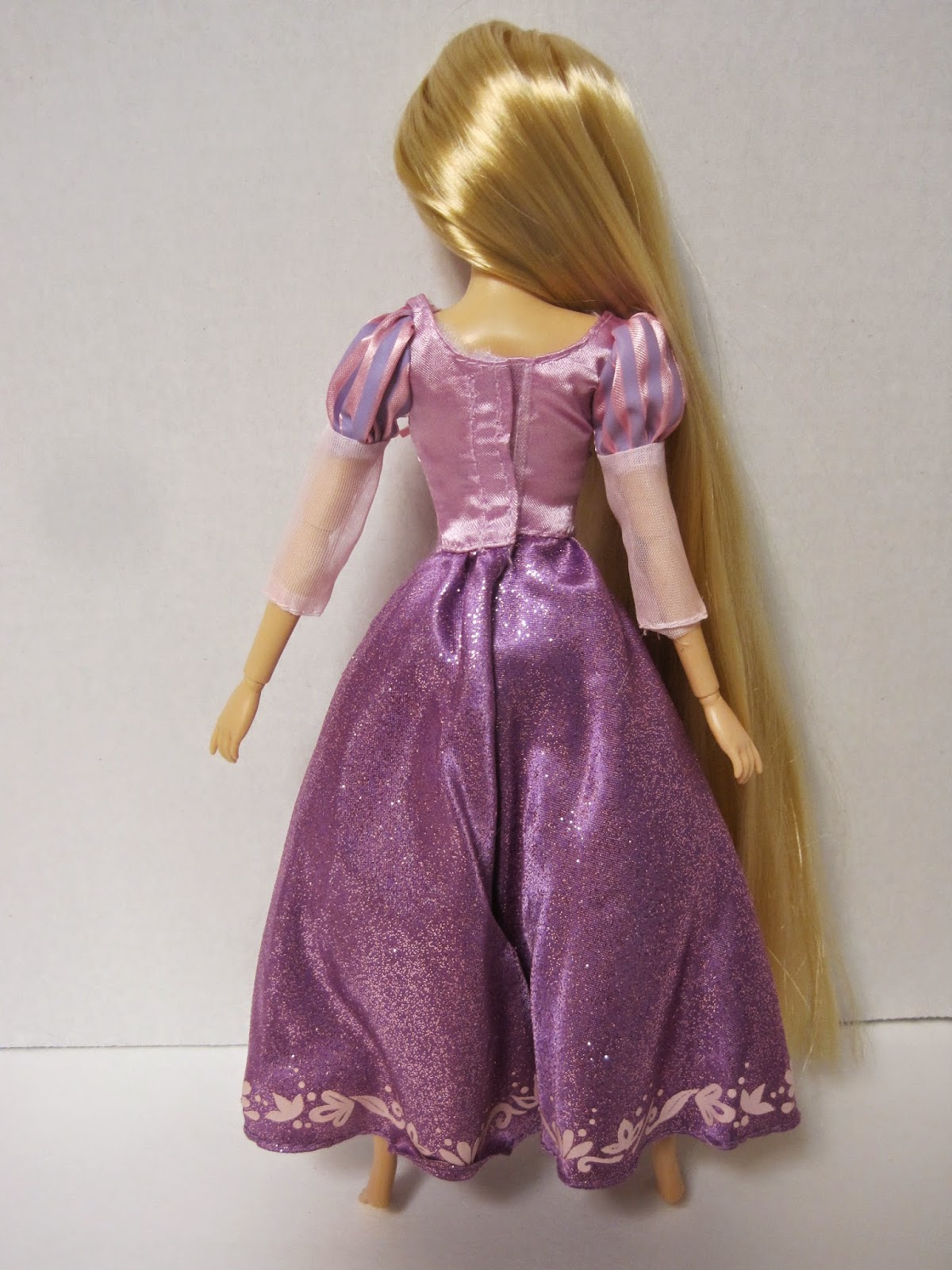 Never Grow Up A Mom's Guide to Dolls and More Disney Store 2014