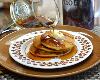 Pumpkin Pancakes ♥ AVeggieVenture.com. Light and fluffy, spiked with pumpkin spices. Recipe, pancake tips, nutrition & WW Weight Watchers points included. 