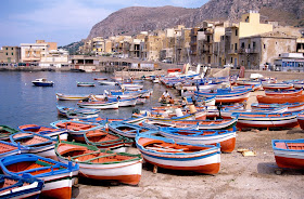 Fishing boats at Aspra, where the colourful scenes inspired Guttuso to paint