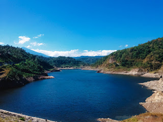 Stunning Landscape Of Lake Water Titab Ularan Dam Between The Hills On A Sunny Day North Bali Indonesia