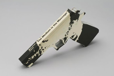 guns crafted from books