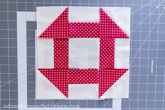 churn dash quilt block fabric laid out and ready to sew