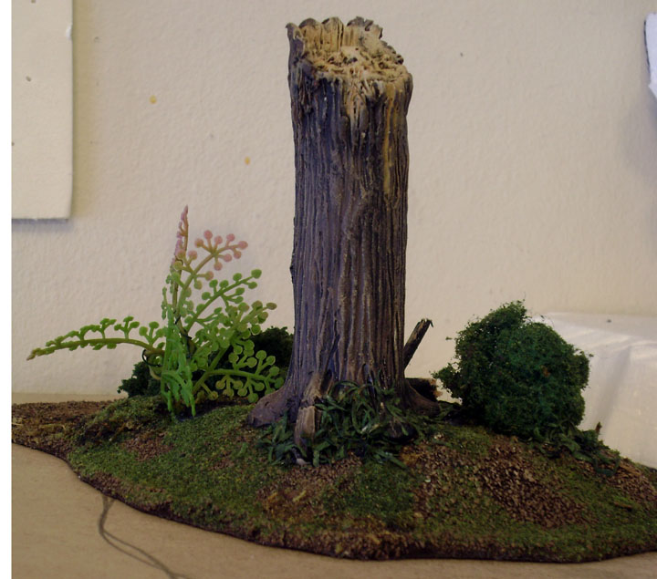  of balsa wood, the broken tree trunk was sculpted from polymer clay