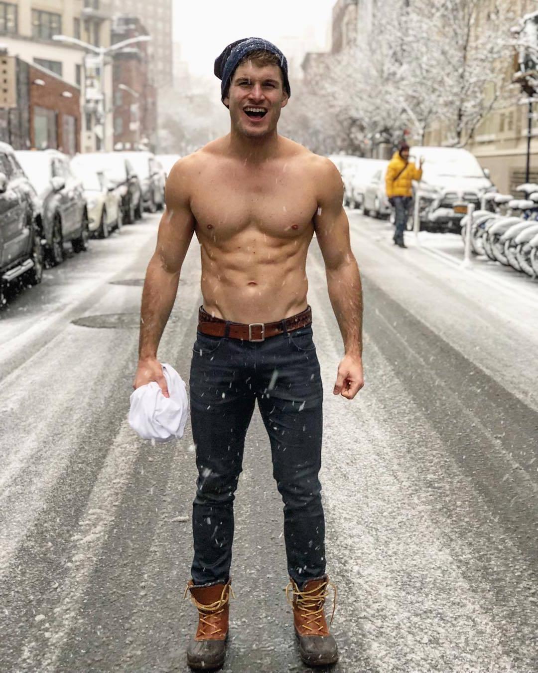 brave-shirtless-fit-bro-vline-body-abs-jeans-beanie-freezing-outside-snowing-city-street