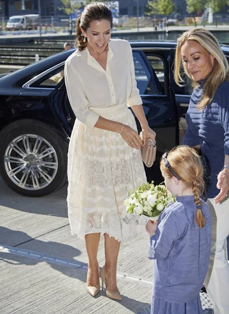 Crown Princess Mary attended the opening of 'Copenhagen Fashion Summit 2016' at the Copenhagen Concert Hall. Crown Princess Mary wore H&M Lace Skirt, Naledi Allana Clutch, Prada Pumps