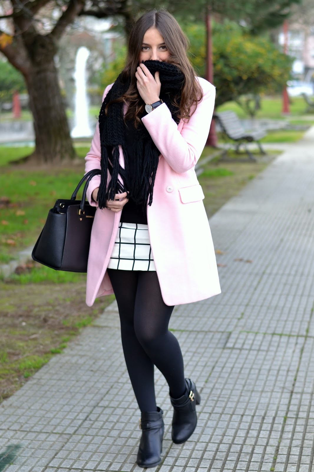 pink coat with black and white