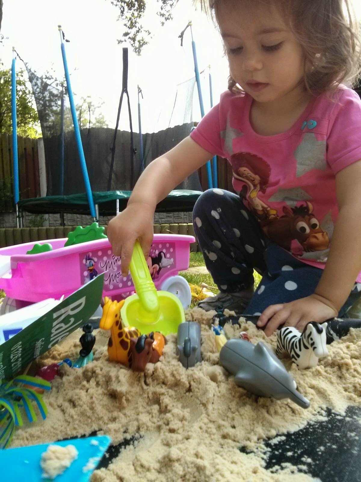 Using sand for messy play