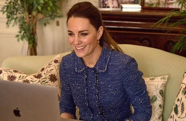 Kate Middleton wore a sparkle tweed ruffle jacket from Rebecca Taylor. Missoma gold mini pyramid charm hoop earrings
