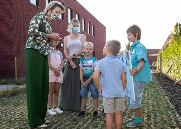 Queen Mathilde's new blouse are from the summer collection of Belgian fashion house Natan