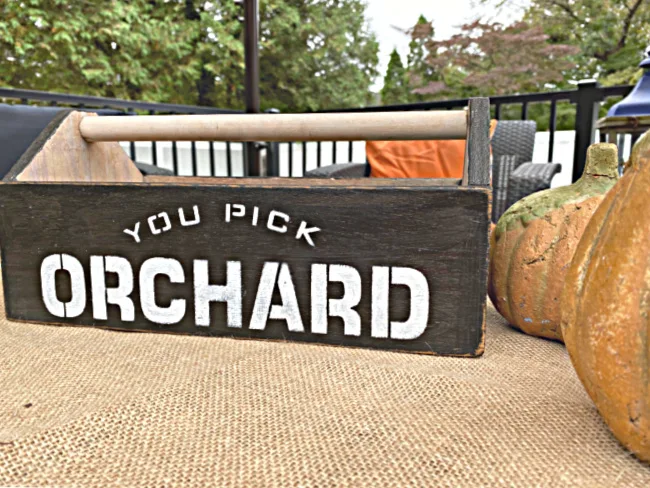 wooden crate with orchard stencil