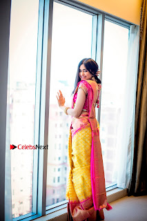 Actress Adah Sharma Exclusive Poshoot in Beautiful Yellow Silk Saree at Saree Niketan Showroom Launch  0007