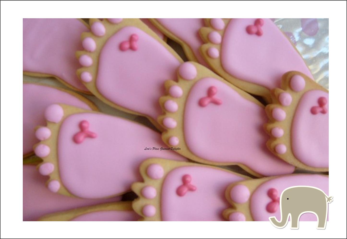 These sugar cookies are in the shape of a tiny foot. You can buy these ...