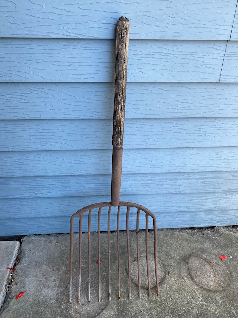 Photo of a vintage hay rake/pitchfork