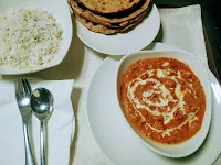 Serving paneer butter masala with jeera rice and roti for paneer butter masala recipe
