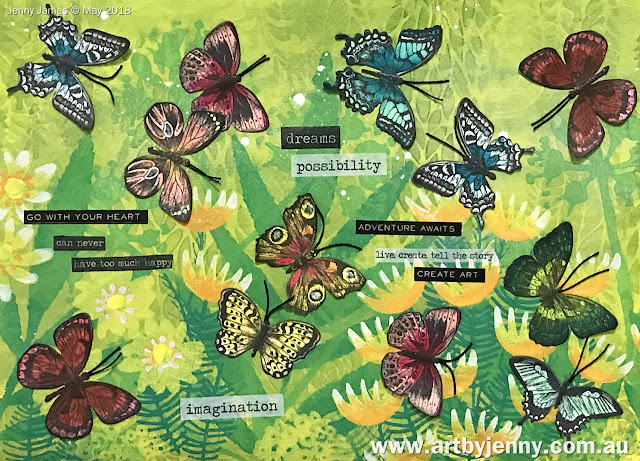 finished flock of butterflies made using stamps, stencils, mermaid markers and paints