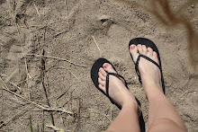 Med fötter i sanden