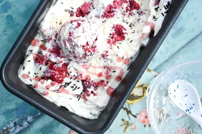 vegan raspberry ripple ice cream in a loaf tin