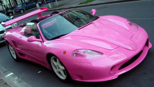 A PINK SPORTS CAR IS JUST WHAT I NEED TO CHEER ME UP BUT I MIGHT 
