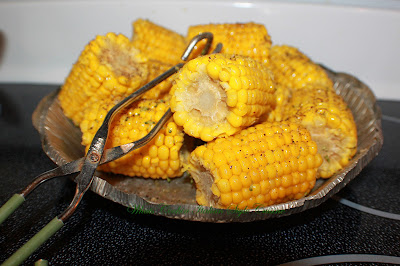 how to cook corn on the cob, this is boiled on an aluminum foil disposable pan with tongs for serving