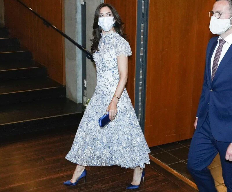 Crown Princess Mary wore a lace floral elodie dress from Moss & Spy, and  silk pumps from Gianvito Rossi. Prada satin clutch