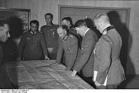 A typical Hitler map session at Fuhrer Headquarters worldwartwo.filminspector.com