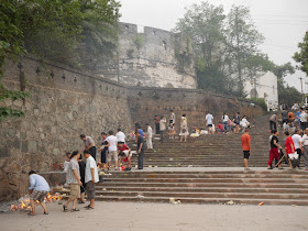 people making offerings for the Hungry Ghost Festival near Xijin gate in Ganzhou