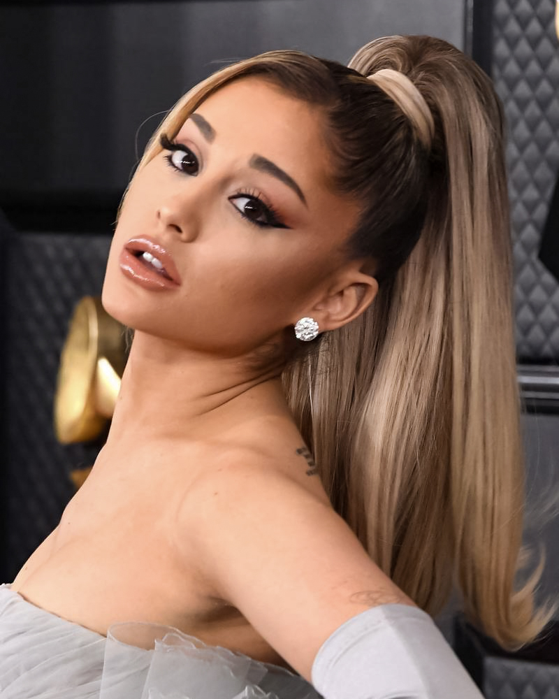 a portrait of ariana grande with a high ponytail hairstyle
