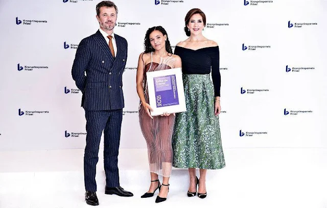 Crown Princess Mary wore a green skirt from H&M conscious exclusive collection. Gianvito Rossi