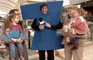 Stephen Colbert as the letter Z interviews a family with two children. Sesame Street All Star Alphabet