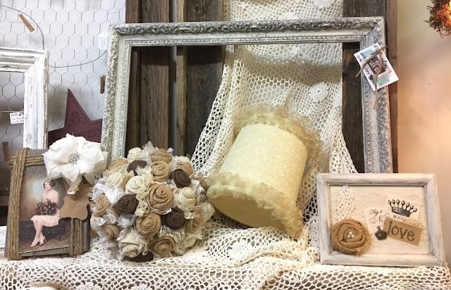 vintage lace and frames on mantle