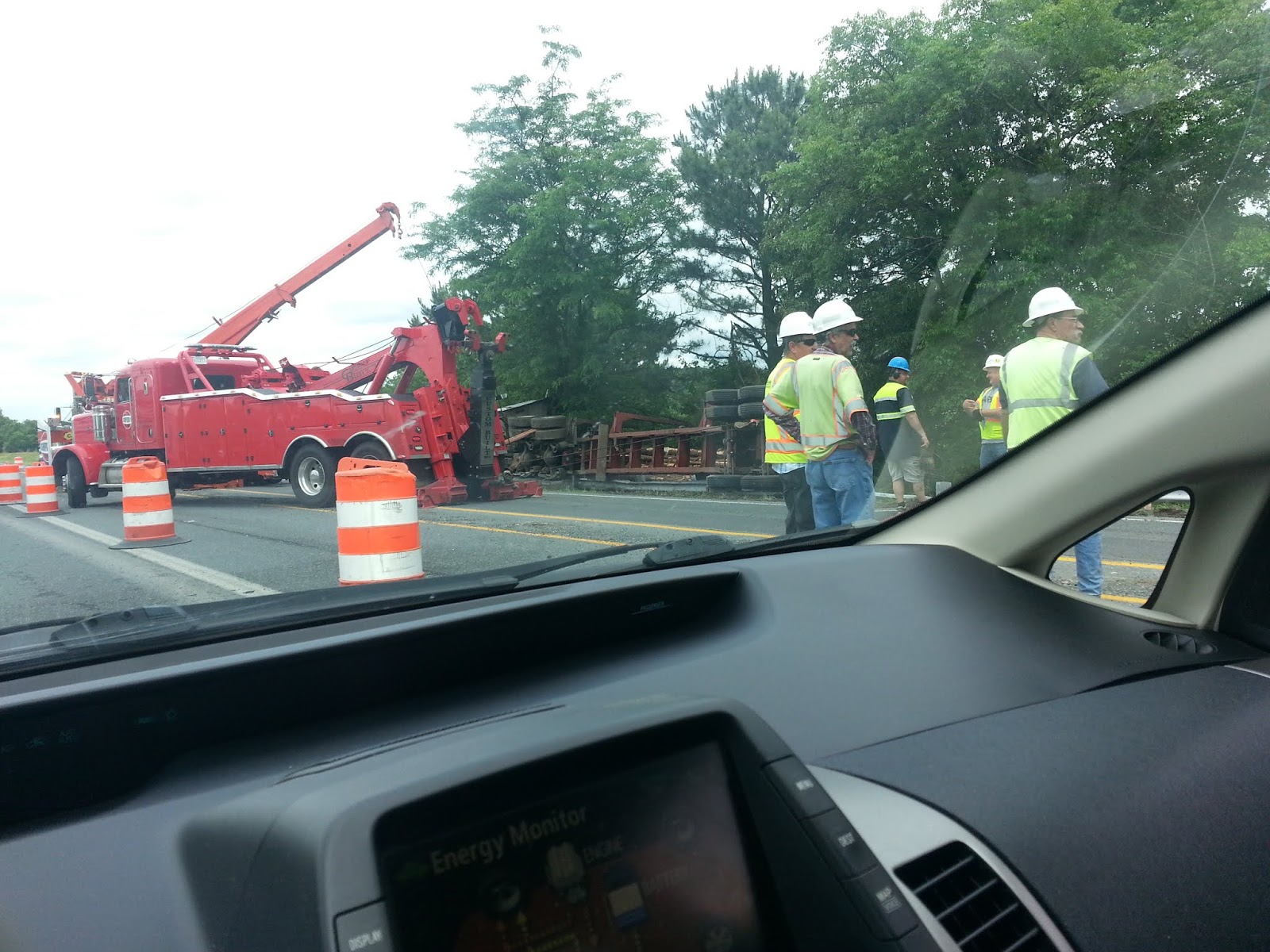 Salisbury News Log truck overturned on bypass by Mt Hermon road right