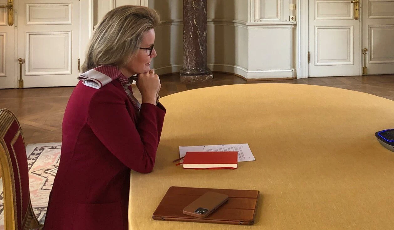 The Schwab Foundation for Social Entrepreneurship. Queen Mathilde wore a red blazer from Natan, and print silk satin scarf from Armani