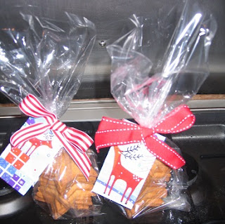 Picture of two bags of Christmas biscuits, with decorative labels and coloured ribbons as Christmas presents Picture of two bags of Christmas biscuits, with decorative labels and coloured ribbons as Christmas presents
