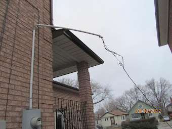 electrician in Windsor, Ontario replaces broken mast and service pipe 226 783 4016